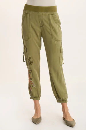 Green cargo pants with floral embroidery on a white background