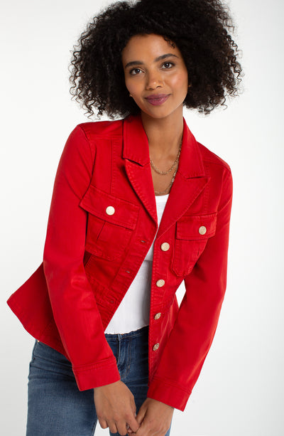 Woman wearing a red jacket on a white background