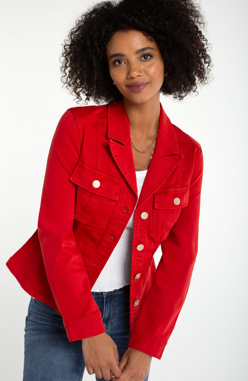 Woman wearing a red jacket on a white background